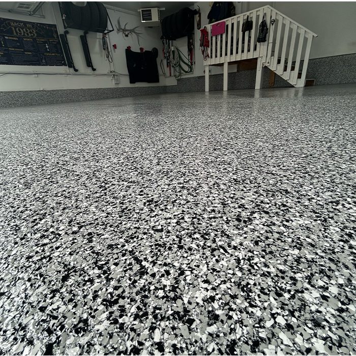 Flake epoxy garage floor in black, white and grey chip